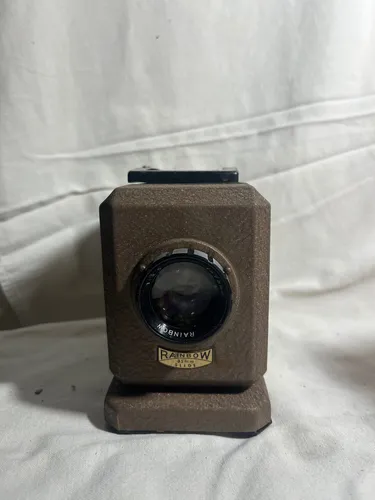 Proyector De Diapositivas Japonés En Su Estuche Original (Usado)