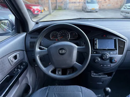 Kia Carens 2.0 Lx 7 Cool