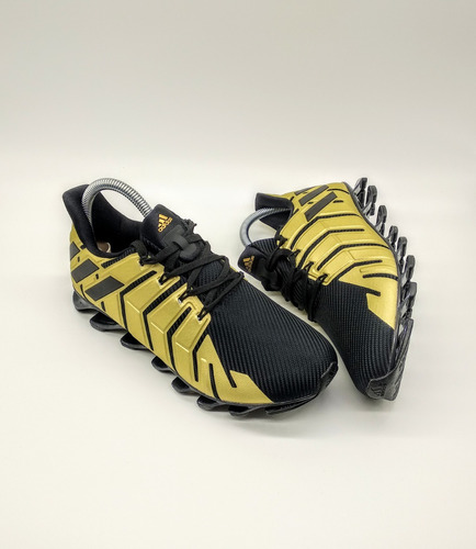 springblade preto e dourado