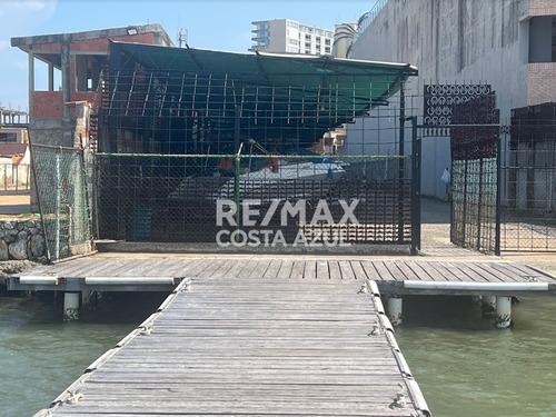 Se Vende Terreno Con Frente A La Laguna De Tucacas Con Uso De Marina Y Anteproyecto De Posada.