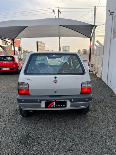 Imagem 4 de 14 de Fiat Uno 1.0 4p Fire Flex Economy Celebration