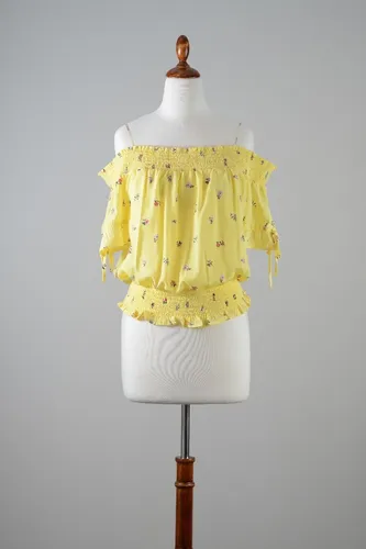 Blusa amarilla online con flores
