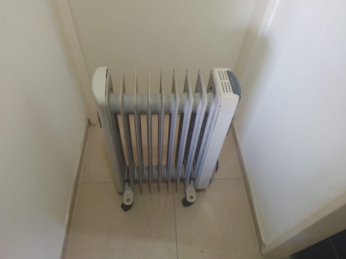 Radiador Electrico Italiano Dhinco 9 Elementos Gtia 18 Meses Gris (Usado)