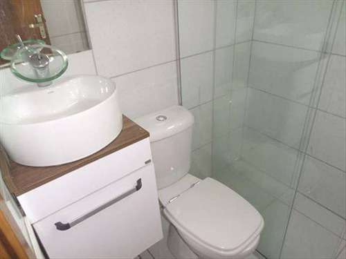 Imagem 16 de 30 de Triplex Sobrado Novo Com 02 Dormitórios 01 Suíte 02 Banheiros Condomínio Fechado Na Vila S. Jorge São Em Vicente Imóvel Este Bem Grande Com 110 M2 Util É Bem Arejado Iluminado Com Churrasqueira Próxi