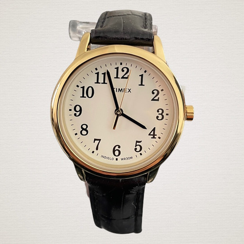 Reloj Mujer Timex Correa De Piel Luz Indiglo Tw2r633009j Correa Negro Bisel Dorado Fondo Blanco