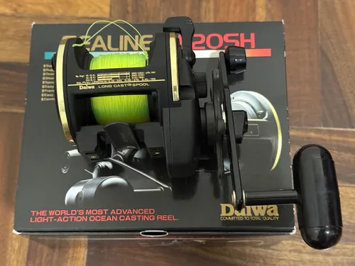 Reel Rotativo Daiwa Sealine Sl20sh Dos Usos Como Nuevo Negro Derecho (Usado)