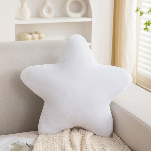 Una Almohada De Felpa En Forma De Estrella