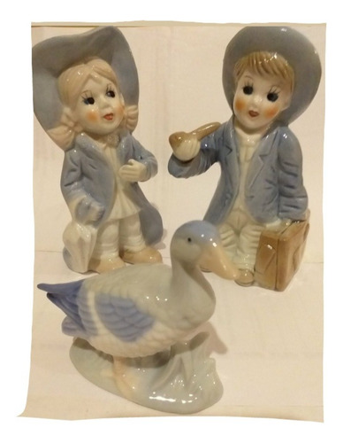 Figuras De Ceramica Impecables Bellisimas Niños Con Pato Azul Claro (Usado)