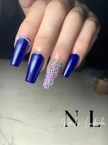 Realizó Uñas Acrílicas