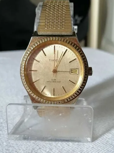 Gold timex marlin hotsell