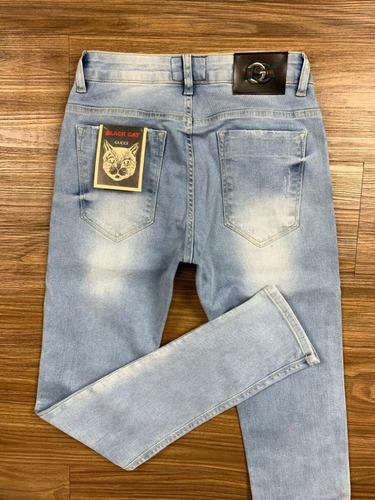 calça gucci jeans