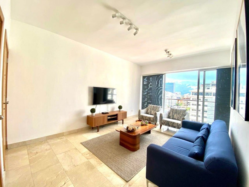 Imagen 2 de 11 de Piantini - Amueblado - 145 Mts2 Piso 10 2 Habitaciones 2.5 Baños 2 Parqueos Techados - Área Social