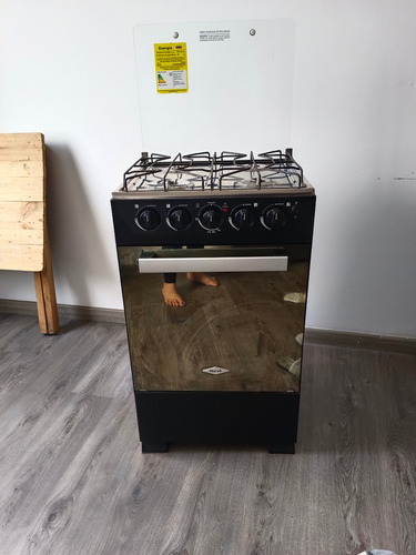 Estufa Vidrio Haceb 50 Cms Gas Negra Con Horno Y Gratinador