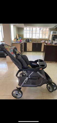 Coche Y Porta Bebé Con Base Incorporada. Baby Trend.