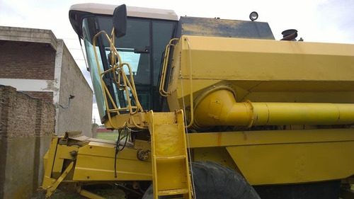 Cosechadora New Holland Tc-57,plataf 23 ,año 1997,m-buena.