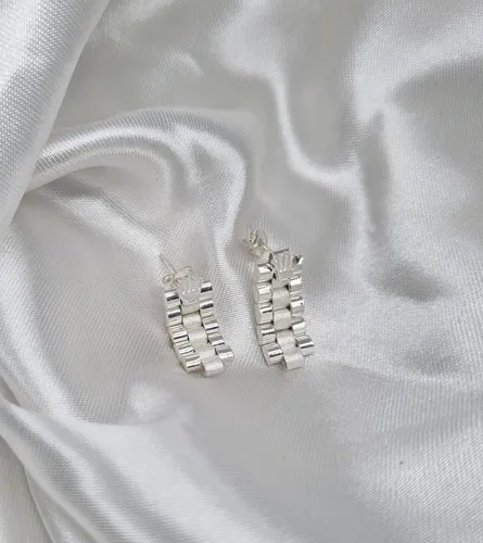 Aretes rolex de mujer sale