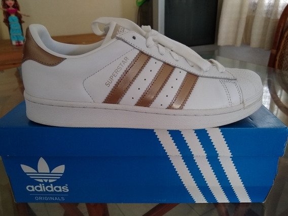 tenis adidas superstar dorados