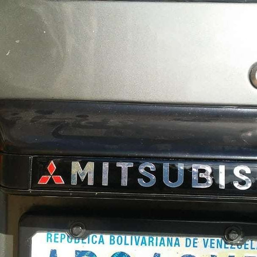 Emblema Mitsubishi Montero Dakar Cromo Relieve Porta Placas