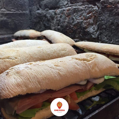 Servicio De Pizzas, Calzones Y Chivitos A La Parrilla