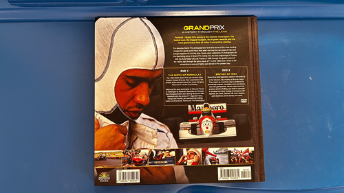 Livro + 2 Dvds Grand Prix History Through The Lens F1 Senna Formula 1 Ferrari Schumacher Hamilton Mclaren Piquet Fittipaldi Lotus Importado (Usado)