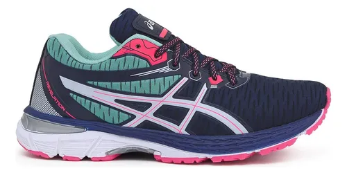 Vista lateral externa do tênis Asics Revelation feminino em azul marinho com detalhes em rosa e turquesa