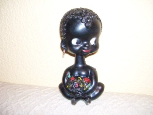 Muñequita Negrita De La Suerte Con Resorte Tipo Funko Kxz
