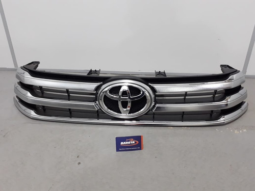 Grade Dianteira Cromada Com Emblema Hilux Srv 16/