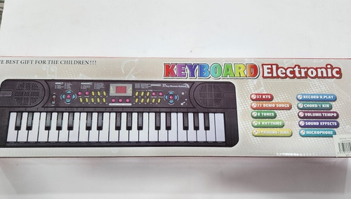 Imagen 2 de 2 de Piano Teclado Musical Con Micrófono Niños Luz Juguete