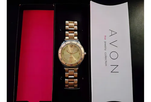 Reloj avon dorado hotsell