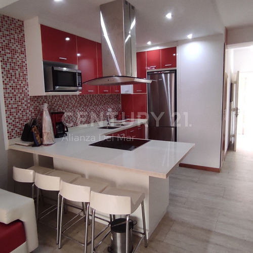 Imagen 10 de 13 de Apartamento Completamente Renovado Y Equipado En Playa Grande ¡vive La Vida De Tus Sueños En Este Oasis De Comodidad Y Elegancia!
