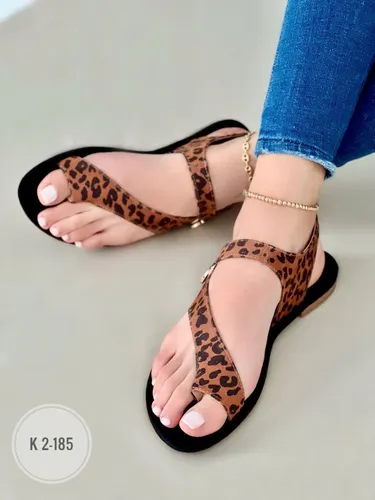 Sandalias planas online animal print
