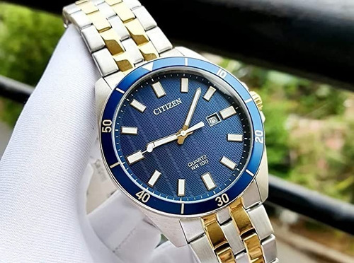 Citizen Quartz Date Two Tone Bi5054-53l ¨¨¨¨¨¨¨¨¨¨¨¨dcmstore Color de la correa Plata Y Oro Color del bisel Plata Y Oro Color del fondo Azul