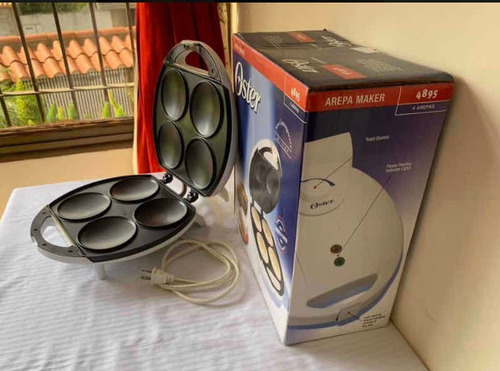 Imagen 5 de 5 de Arepera Eléctrica Oster De 4 Arepas Ayudante Cocina 575