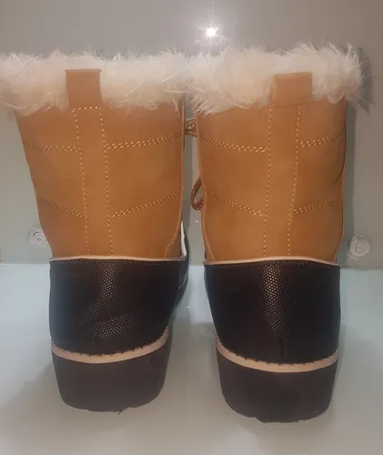 Global win boots top