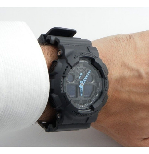 Reloj Casio G-shock Ga-100c-8a Analogico Azul Original
