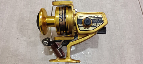 Molinete Daiwa Millionmax Gs-9000 Dourado Direito/esquerdo (Usado)