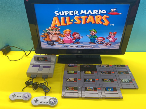 Consola Super Nintendo Con 2 Controles Y Un Juego A Escoger