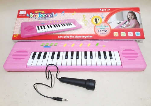 Imagem 3 de 7 de Teclado Infantil Rosa Com Microfone - Musical Resistente