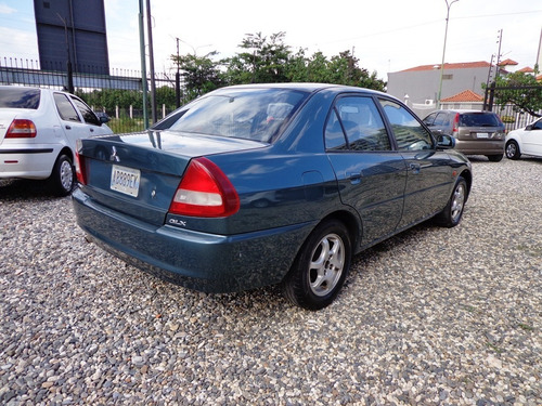 Imagen 5 de 14 de Mitsubishi Signo Glx 2010 Automático
