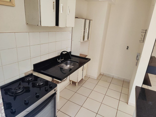Apartamento Aconchegante Com 2 Dormitórios, Ar-condicionado, Banheiro Social Com Box, Sala Com 2 Ambientes E Sacada/varanda, Cozinha Tipo Americana, Área De Serviço, Piso Frio, 1 Vaga De Garagem.