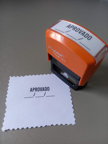 El sello automático dice que está aprobado con fecha naranja