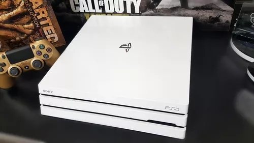 Ps4 pro branco + 4 jogos fisicos / pego slim na troca em Curitiba