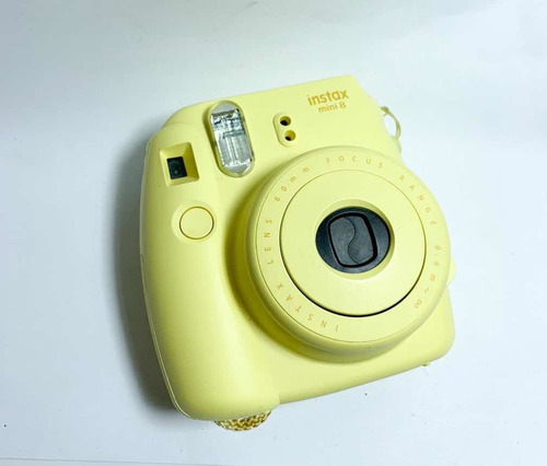Câmera Instax Amarela (usada)