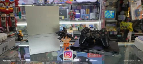 Playstation 2 Con 2 Controles Y Obsequio (Usado)