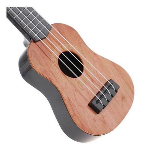 Imagen 1 de 3 de Mini Guitarra 4 Cuerdas De Juguete 28x10 Cm