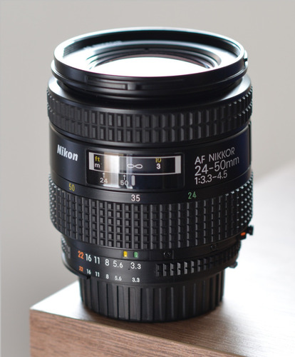 Nikon Af 24-50mm F/3.3-4.5 Zoom + Parasol Original Hb-3 