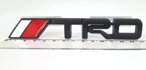 Imagem 1 de 4 de Emblema Trd Toyota Hilux Grade Dianteira Sw4 Srv Com Suporte