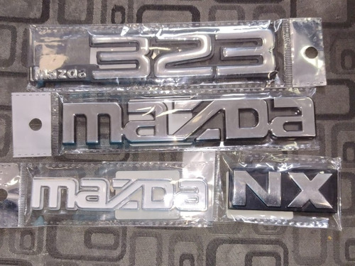 Combo Pack De 4 Emblemas Para Mazda 323 Nx Genéricos Nuevos 