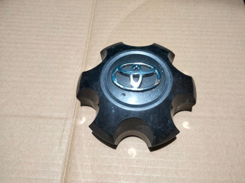 Tapa De Rin Toyota Tacoma Línea Nueva Usada Original