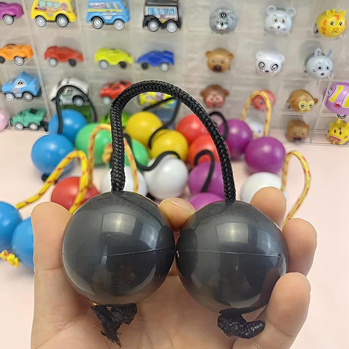 Instrumentos Rítmicos De Percusión De Bolas Con Una Sola Man